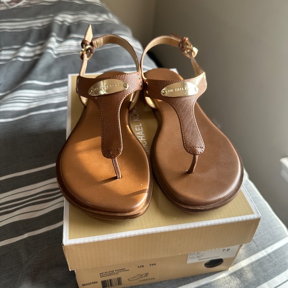 MICHAEL Michael Kors
Women's MK Plate Flat
Thong Sandals - Picture 1 of 3